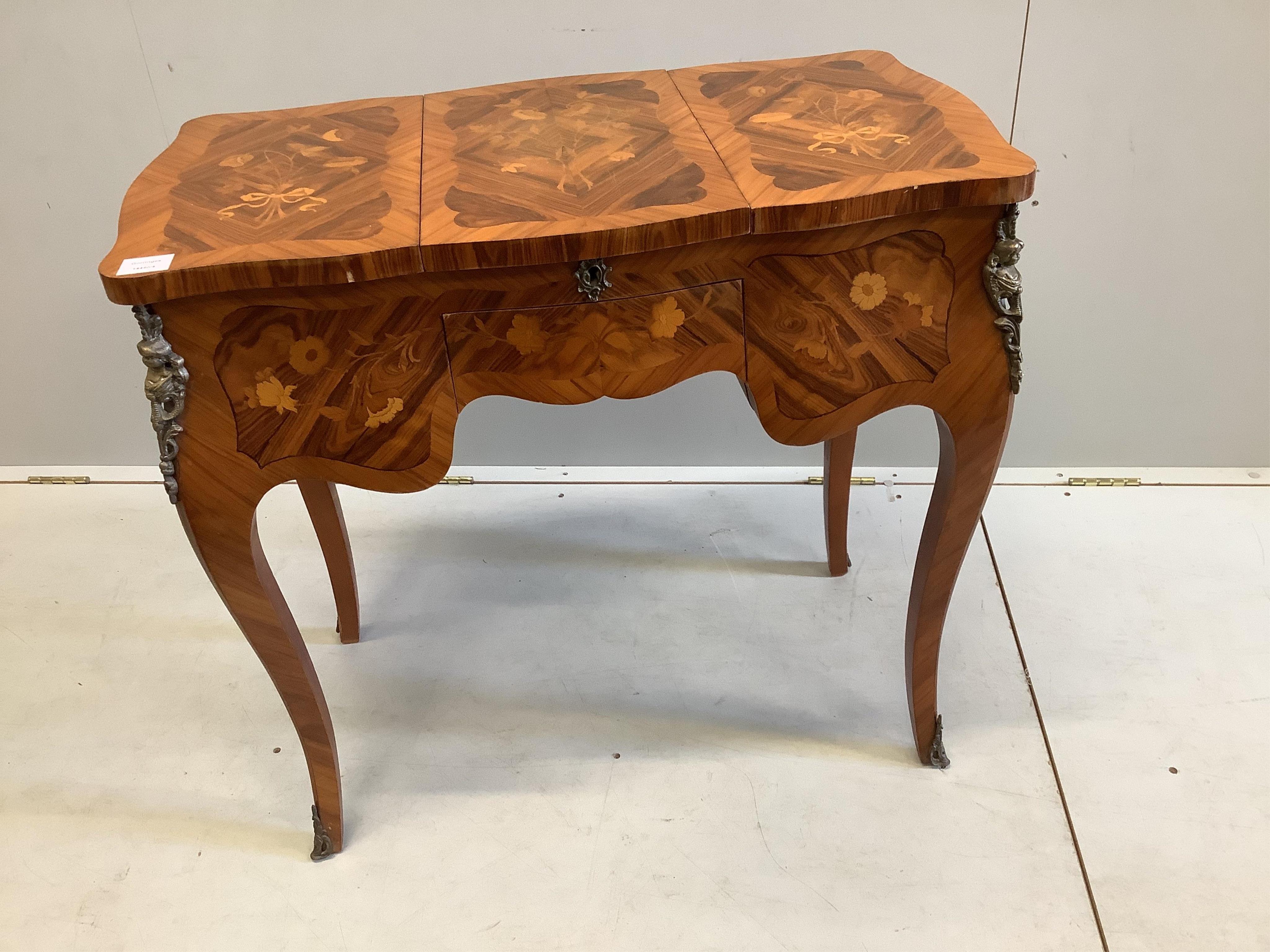 A French marquetry inlaid kingwood poudreuse, width 82cm, depth 36cm, height 74cm. Condition - good